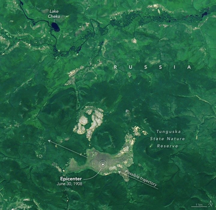 the rich green landscape includes Lake Cheko along a river that meanders along the top of the image. In the lower center there is a crater and possible trajectory line where the landscape color lightens..