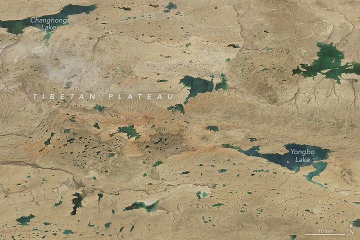Changhong Lake is nestled in the upper left of this image filled with numerous small lakes on the otherwise barren landscape without foliage. In the lower right is another named lake, Yongbo Lake.