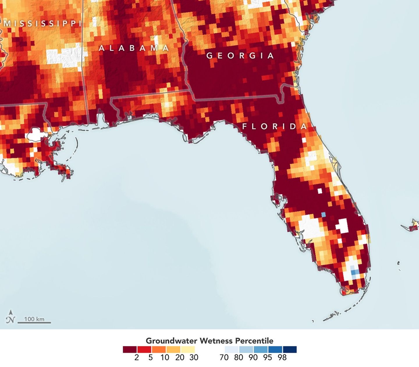 A map of Florida shows the driest aquifers in red and orange.