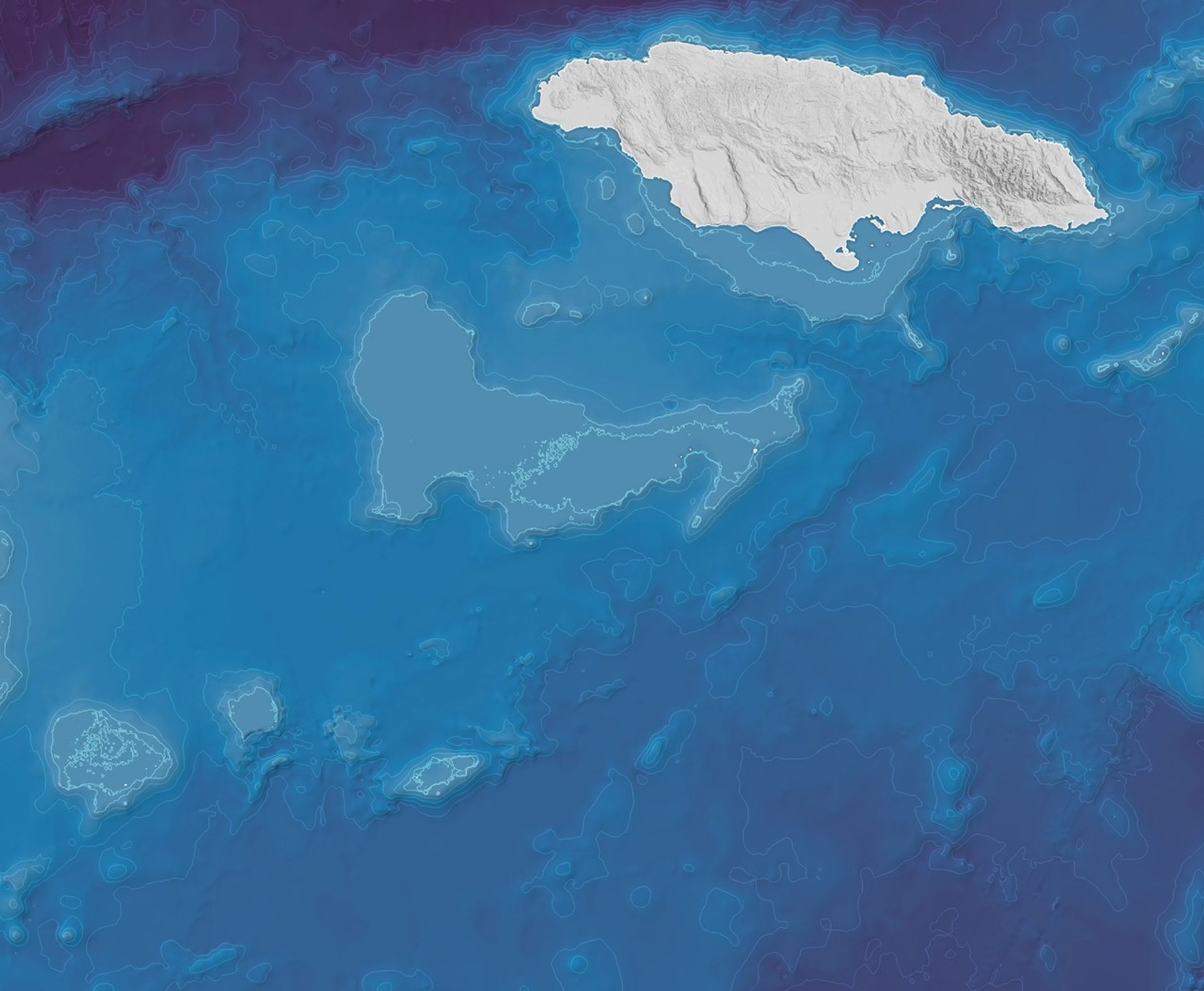 A bathymetric map of part of the Caribbean Sea shows Jamaica in the upper right and the large, flat-topped Pedro Bank at the center, which sits 20 to 30 meters below the surface and displays steep edges. Several smaller shallow shelves appear in the lower left.