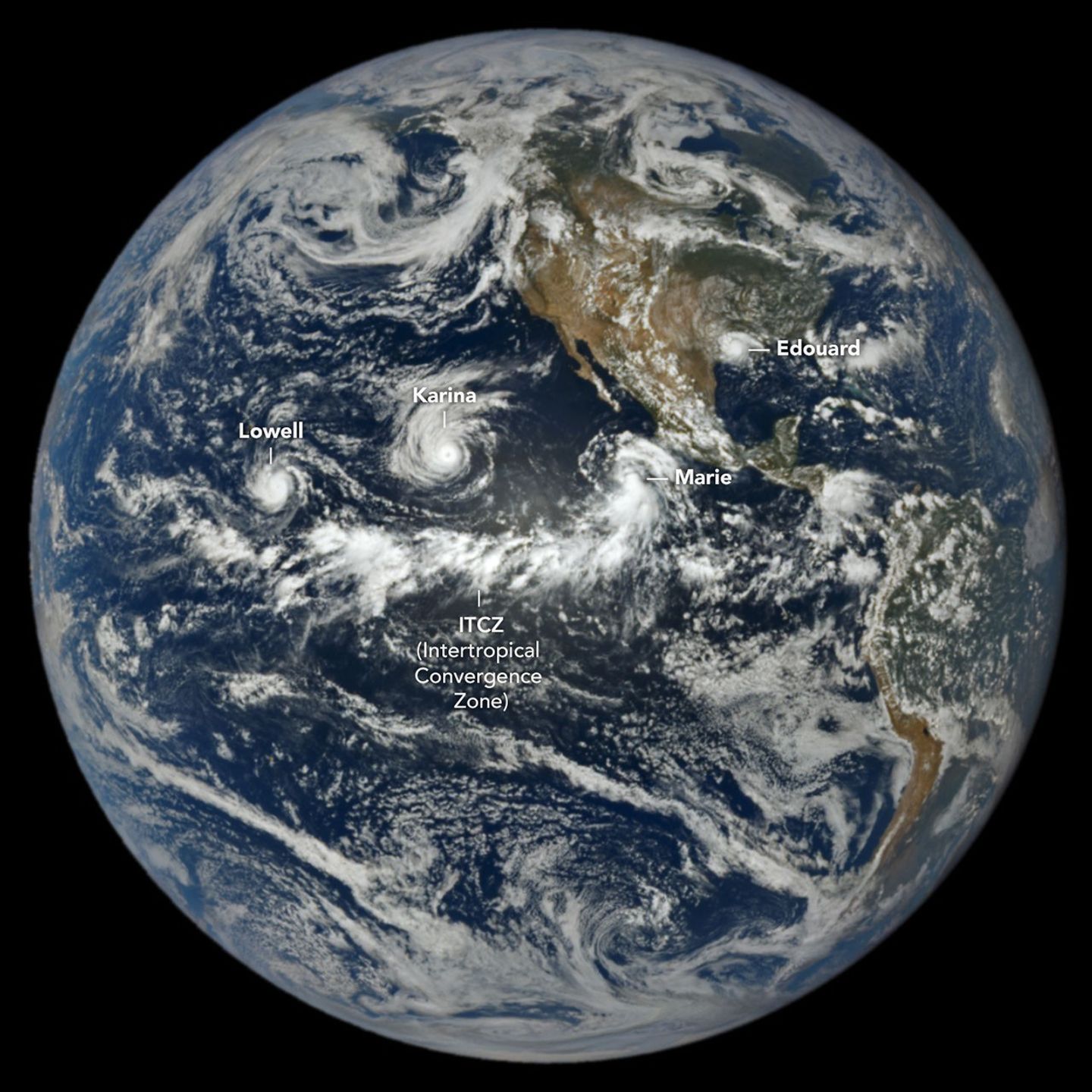 In a full-disk satellite view of Earth, three tropical cyclones—named Lowell, Karina, and Marie—swirl above the blue waters of the Pacific Ocean and to the west of Central America.