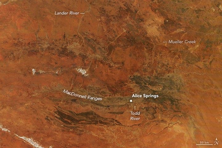 Central Australia’s desert landscape appears predominantly rusty red.