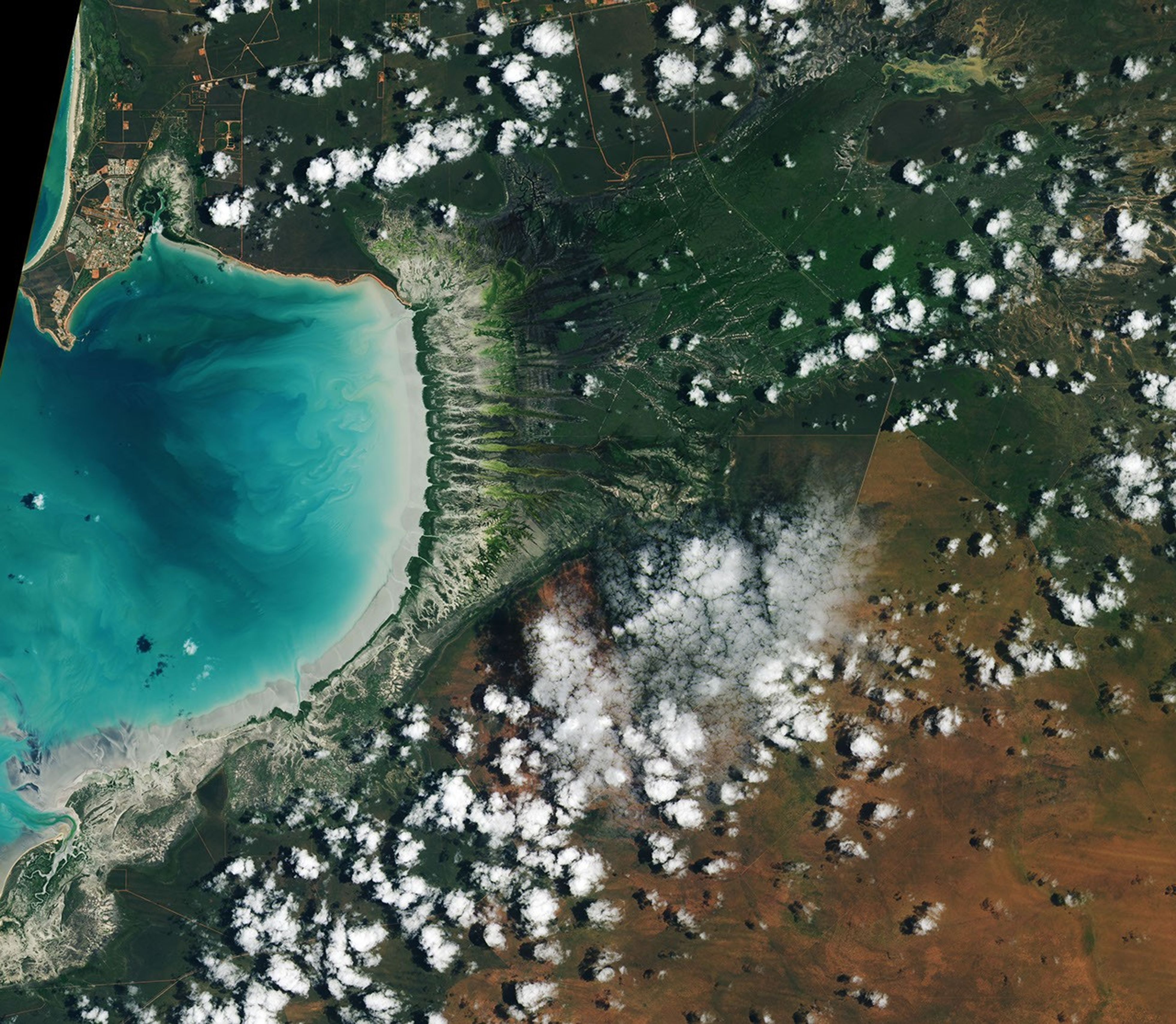 Tidal and seasonal shifts leave their mark on this crescent-shaped, productive bay in Western Australia's Kimberley region.