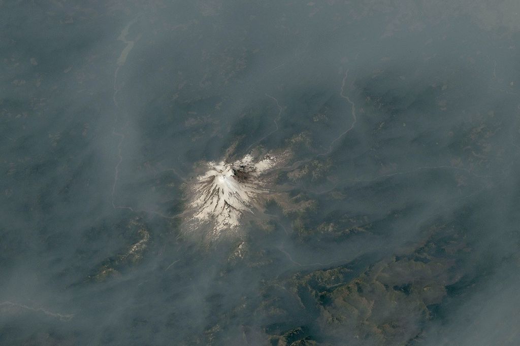Cascade Volcanoes Shrouded in Smoke