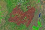 An image of the same area shows a large brown patch spanning much of the image in an image acquired after the fire on June 29, 2026.