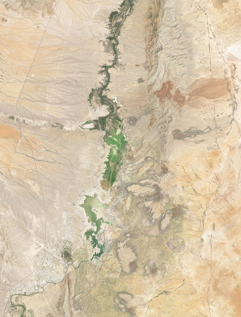 A three-part image shows Elephant Butte Reservoir in New Mexico in 1994, 2013, and 2026. In 1994, on the left, the lake is nearly full. In the other two years, it is close to empty.