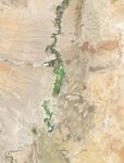 A three-part image shows Elephant Butte Reservoir in New Mexico in 1994, 2013, and 2026. In 1994, on the left, the lake is nearly full. In the other two years, it is close to empty.