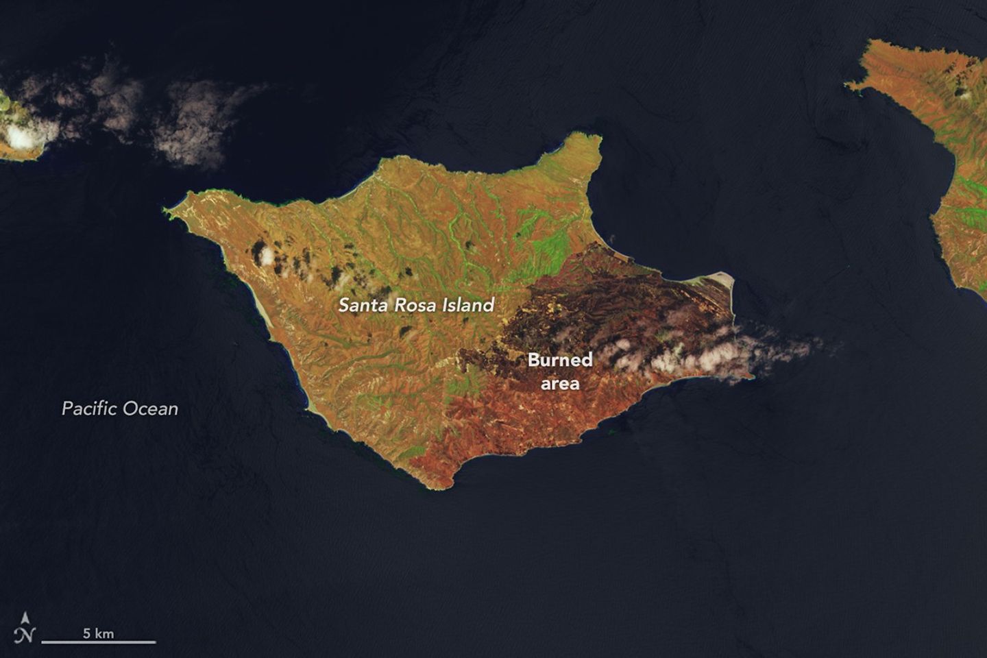 A false-color image of Santa Rosa Island from May 24, 2026, shows a reddish-brown burned area spanning the eastern third of the island.