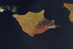 A false-color image of Santa Rosa Island from May 24, 2026, shows a reddish-brown burned area spanning the eastern third of the island.