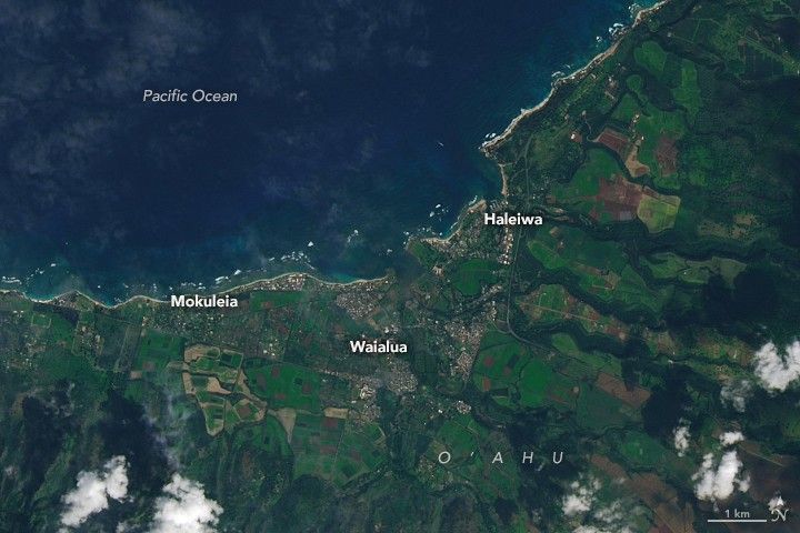 Coastal towns and green farmland are unaffected by floodwater, and the ocean is mostly blue.