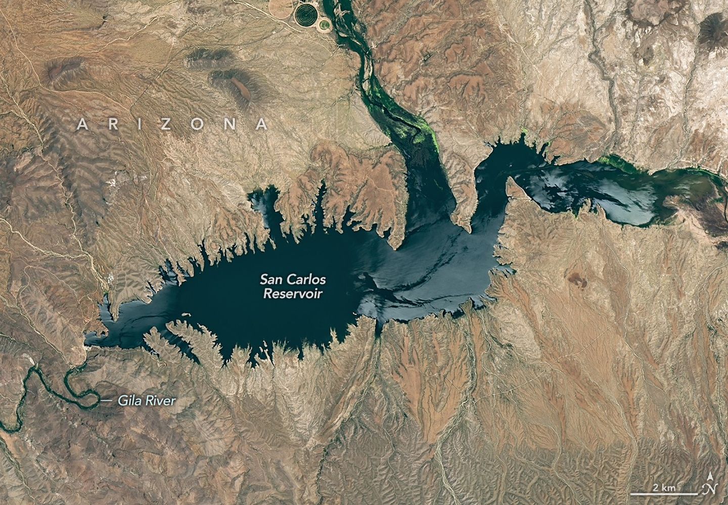 The reservoir appears lake-like and expansive in an image acquired in June 2023.