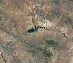 The reservoir appears lake-like and expansive in an image acquired in June 2023.