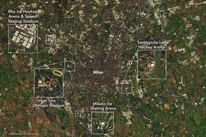 Satellite image of Milan, Italy, showing gray and dark-brown urban areas surrounded by green and tan agricultural land. Multiple Olympic sports venues are labeled and highlighted with white boxes, including ice hockey and speed skating locations, each with inset detailed views.