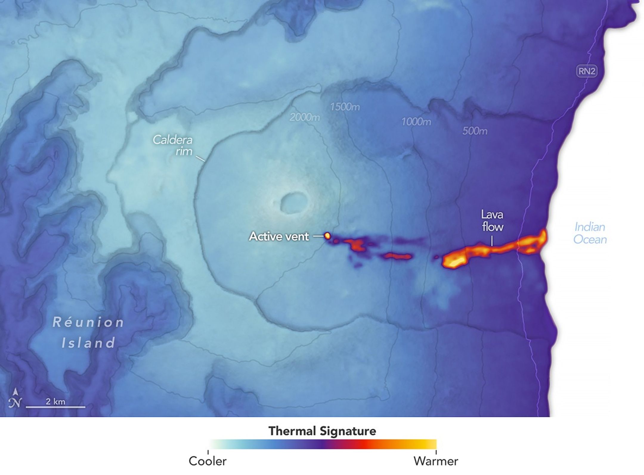 Thermal image of Piton de la Fournaise showing a bright lava flow on the southeastern flank contrasted with cooler vegetation and rock.