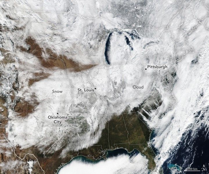 Much of the central, Midwest, and northeast United States is covered in a layer of white snow.