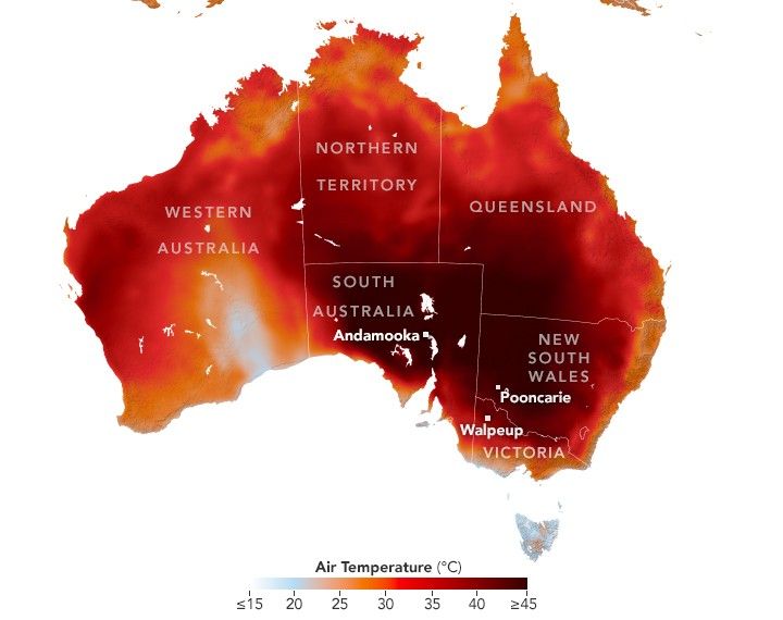 A map of Australia depicts near-surface air temperatures, where most of the country is warm, shown as orange to red. Extreme heat is concentrated over the southeast, and a small cooler blue area appears in Western Australia.