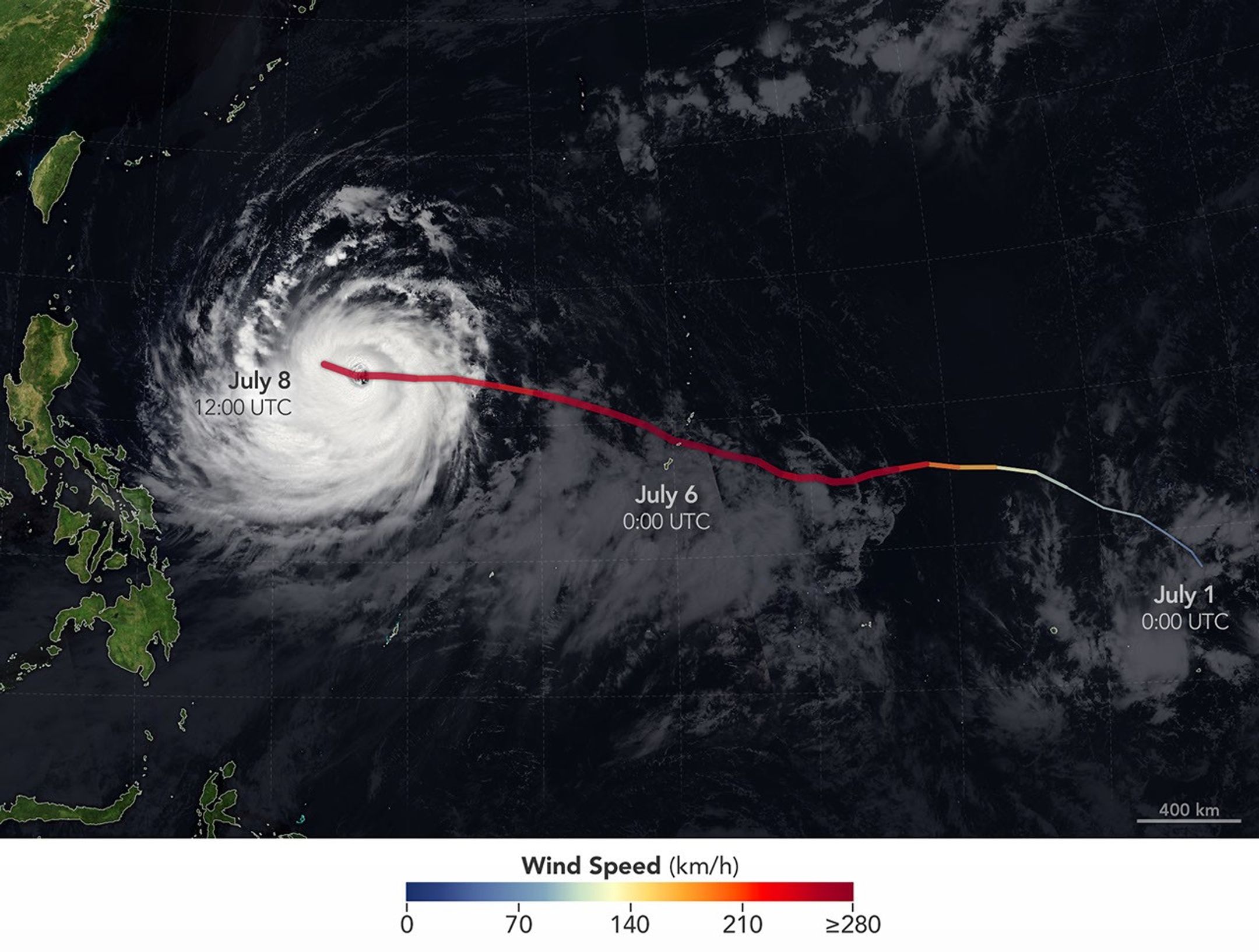 The spiraling clouds of Super Typhoon Bavi appear over the Philippine Sea southeast of Taiwan. The storm’s westward track is shown in colors corresponding to wind speed.