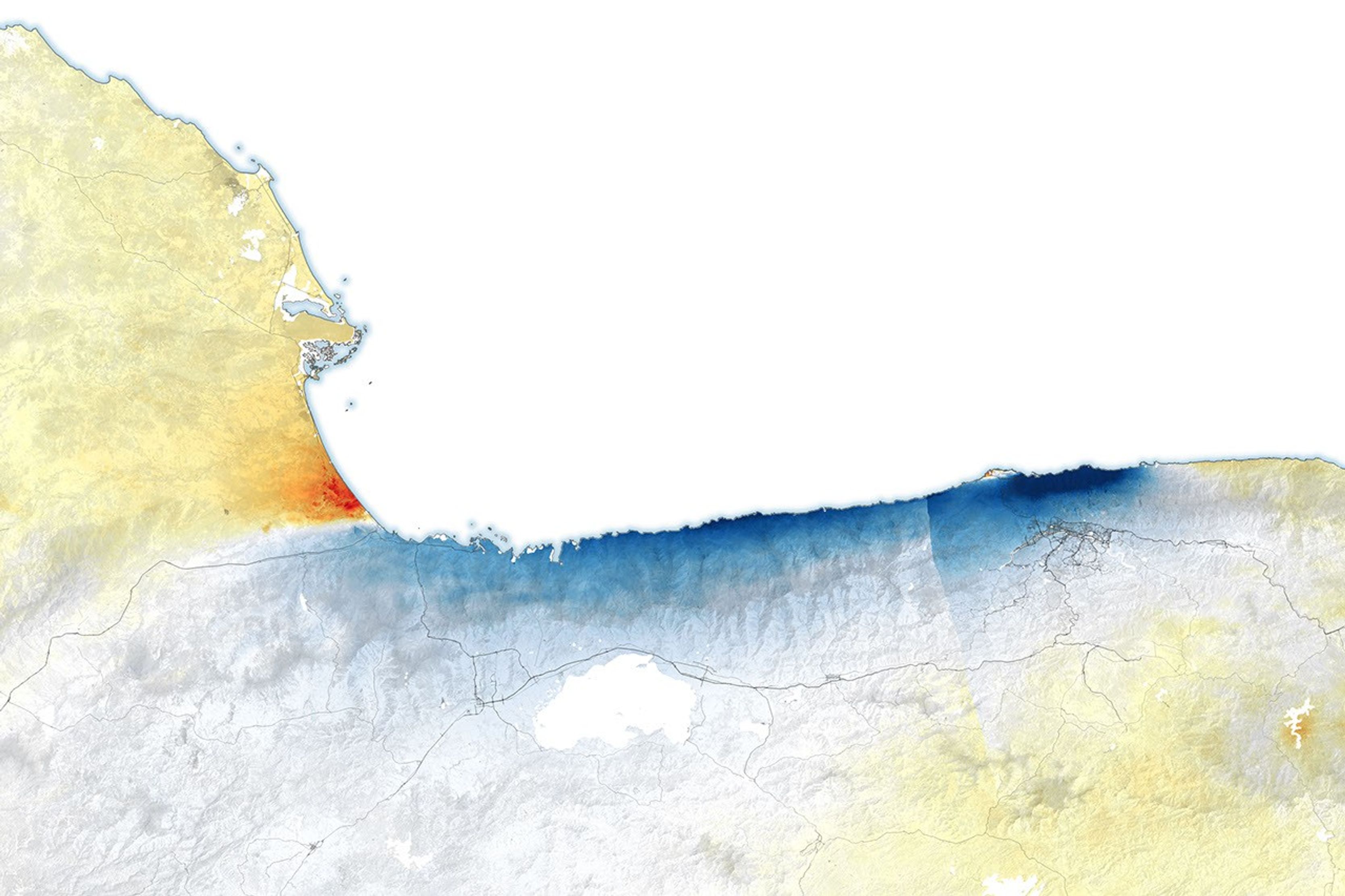 A satellite-derived map of northern Venezuela’s coast displays red where ground shifted eastward and blue where it shifted westward. A thin white line marks where the fault ruptured below ground.