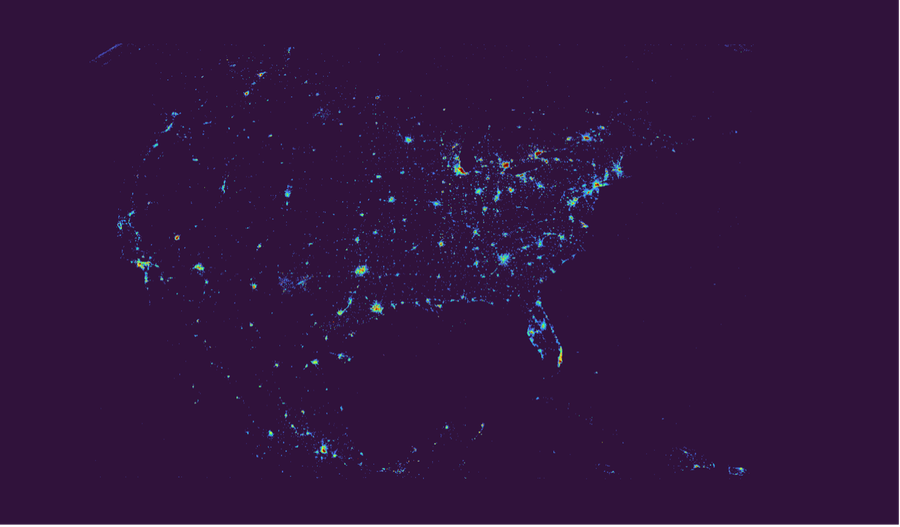 A darkened image of the continental US with spots of light ranging in intensity and color.