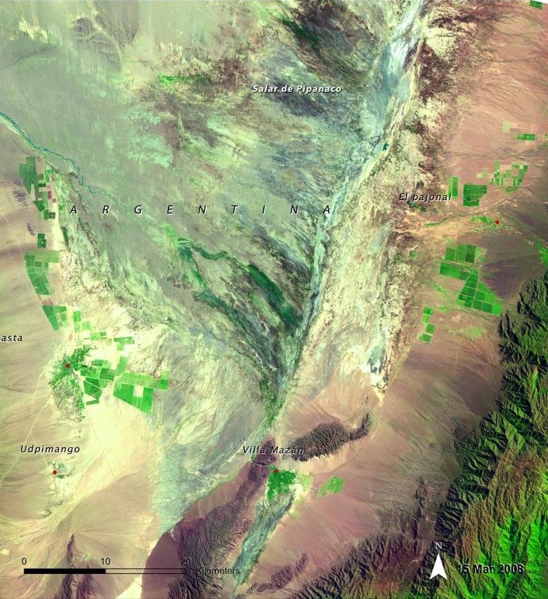 Aimogasta is a regional center of olive production, trade and tourism. Expansion of the agricultural frontier in this region has led to increased wind and water erosion, salinization, and loss of biodiversity. In the 2008 image, cultivated fields that did not exist in 1975 are visible around Aimogasta, Villa Mazán and El Pajonal (seen as green areas with regular geometric patterns).   Source: United Nations Environment Programme (UNEP). From Latin America and the Caribbean Atlas of our Changing Environment (2010).