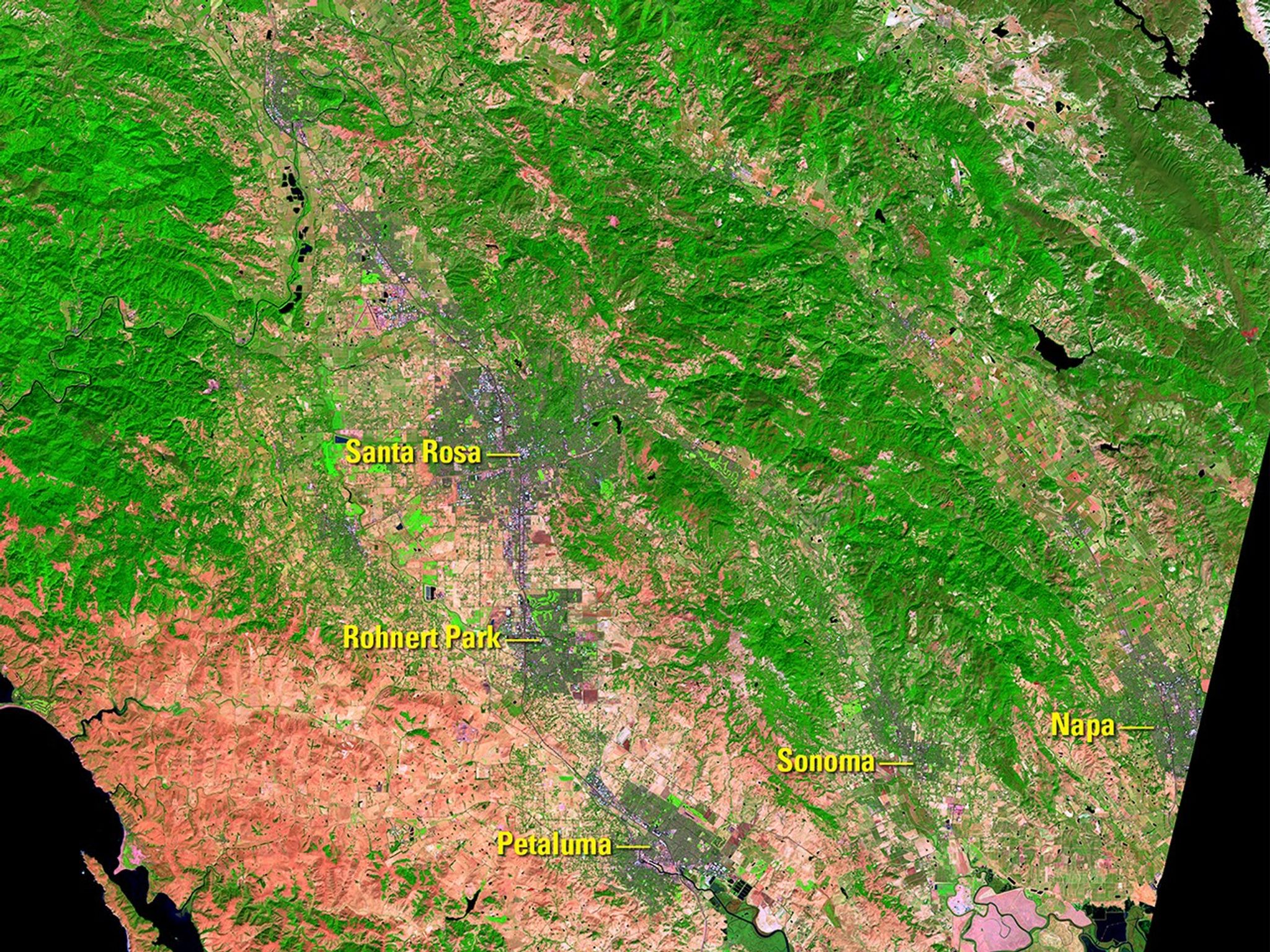 Wildfires fanned by wind gusts of 50 mph (80 kph) broke out on Oct. 8, 2017, burning more than 100,000 acres of California wine country by the time of the Oct. 11 image. A wet winter had encouraged the growth of vegetation, which dried out during a hot, dry summer and became fuel for the fires. Burned areas appear maroon and smoke appears light blue in the Oct. 11 image. The colors are false because the images were made from infrared data.   Images taken by Landsat 8. Source: USGS Land Remote Sensing Image Collections.
