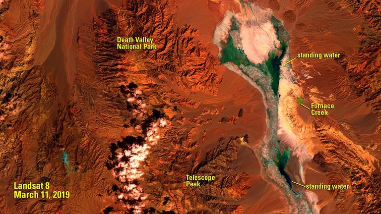 Death Valley is one of the driest places in North America. A typical March sees about a third of an inch (about 8 millimeters) of rain. The 2018 image shows the mountains west of Furnace Creek as the area usually appears during that time of year. Saturated sediment and shallow pools of water are displayed in a light aqua color. The 2019 image shows the same area less than a week after it received more than an inch of rain in just two days. The deeper pools that resulted appear nearly black.   Images taken by the Operational Land Imager on Landsat 8. Source: U.S. Geological Survey’s National Land Imaging Image Collections