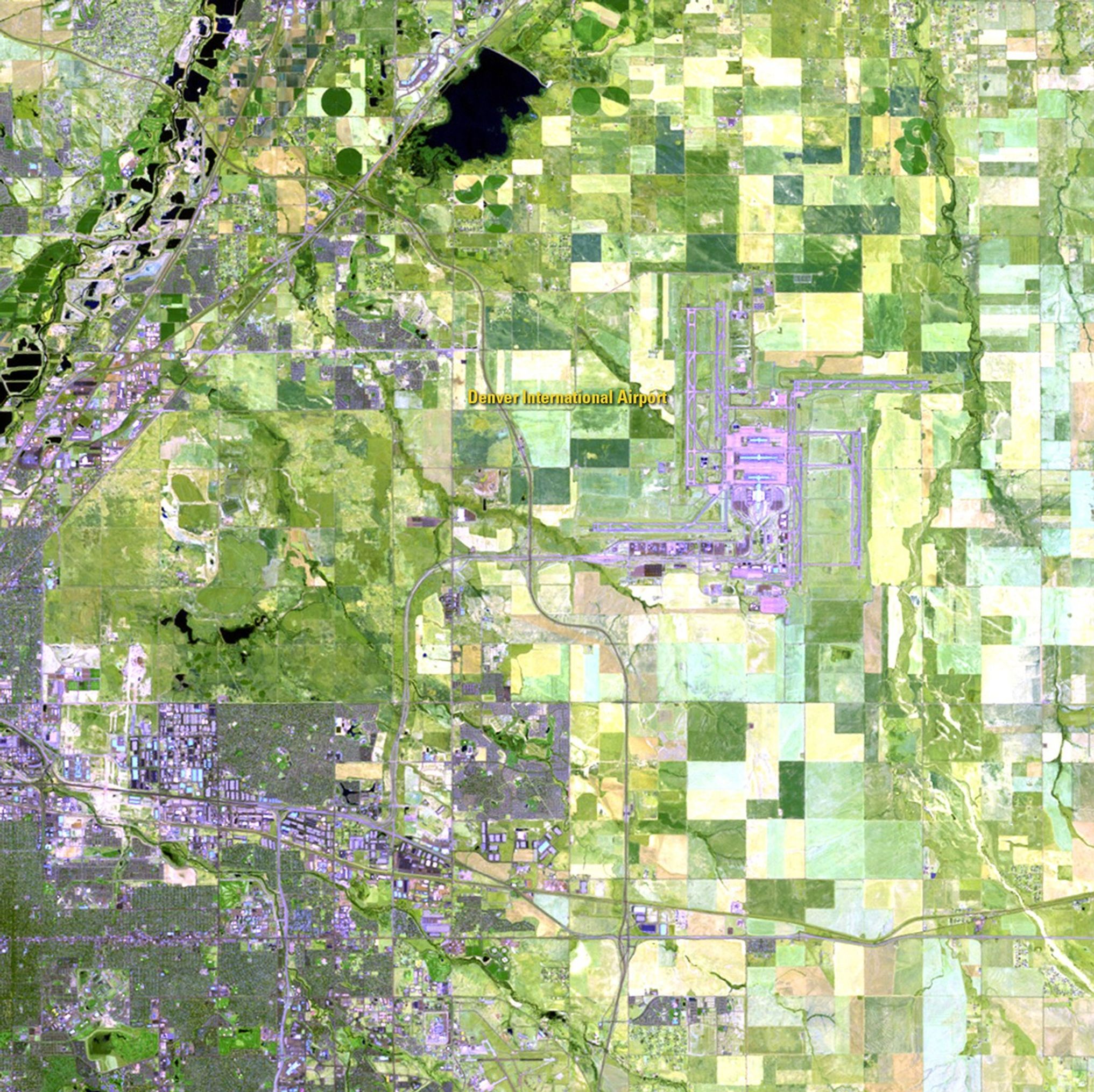 Denver International Airport covers 53 square miles (nearly 140 square kilometers), making it the largest airport in the United States and the third largest in the world. The 1984 image shows the landscape before airport construction began, and the 2011 image shows the same area with the airport in operation. In addition to the aviation hub itself, hotels, manufacturing and residential development have expanded, covering what had previously been farmland. Data from the Landsat satellite are used by regional and local officials to monitor the rate and direction of the expanded development.   Images taken by the Thematic Mapper sensor onboard Landsat 5. Source: U.S. Geological Survey (USGS) Landsat Missions Gallery, "Denver International Airport," U.S. Department of the Interior / USGS.