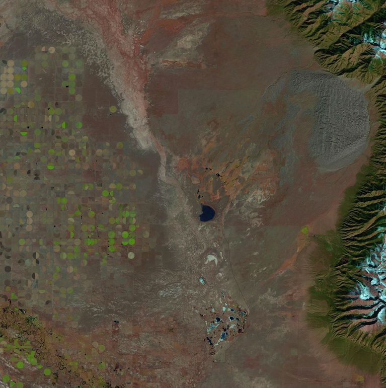The Great Sand Dunes National Park and Preserve, home of the tallest sand dunes in North America, is the newest U.S. national park. It is located in the San Luis Valley at the base of the Sangre de Cristo Range in Colorado. The valley’s stream flows change from season to season and year to year, and these images show the difference between 1987 and 2011.