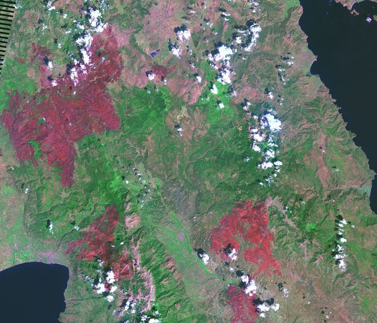 On August 24, 2007, the first of more than 170 fires broke out on the Greek Peloponnesus. The fires, of undetermined origin, cut a swath of destruction across the peninsula. They razed hundreds of villages, threatened the ancient historic site of Olympia and endangered the city of Sparta. These images show the area before and after the fires. Images taken by the Enhanced Thematic Mapper Plus sensor onboard Landsat 7. Source: U.S. Geological Survey (USGS) Landsat Missions Gallery, "Greece Fires," U.S. Department of the Interior / USGS.