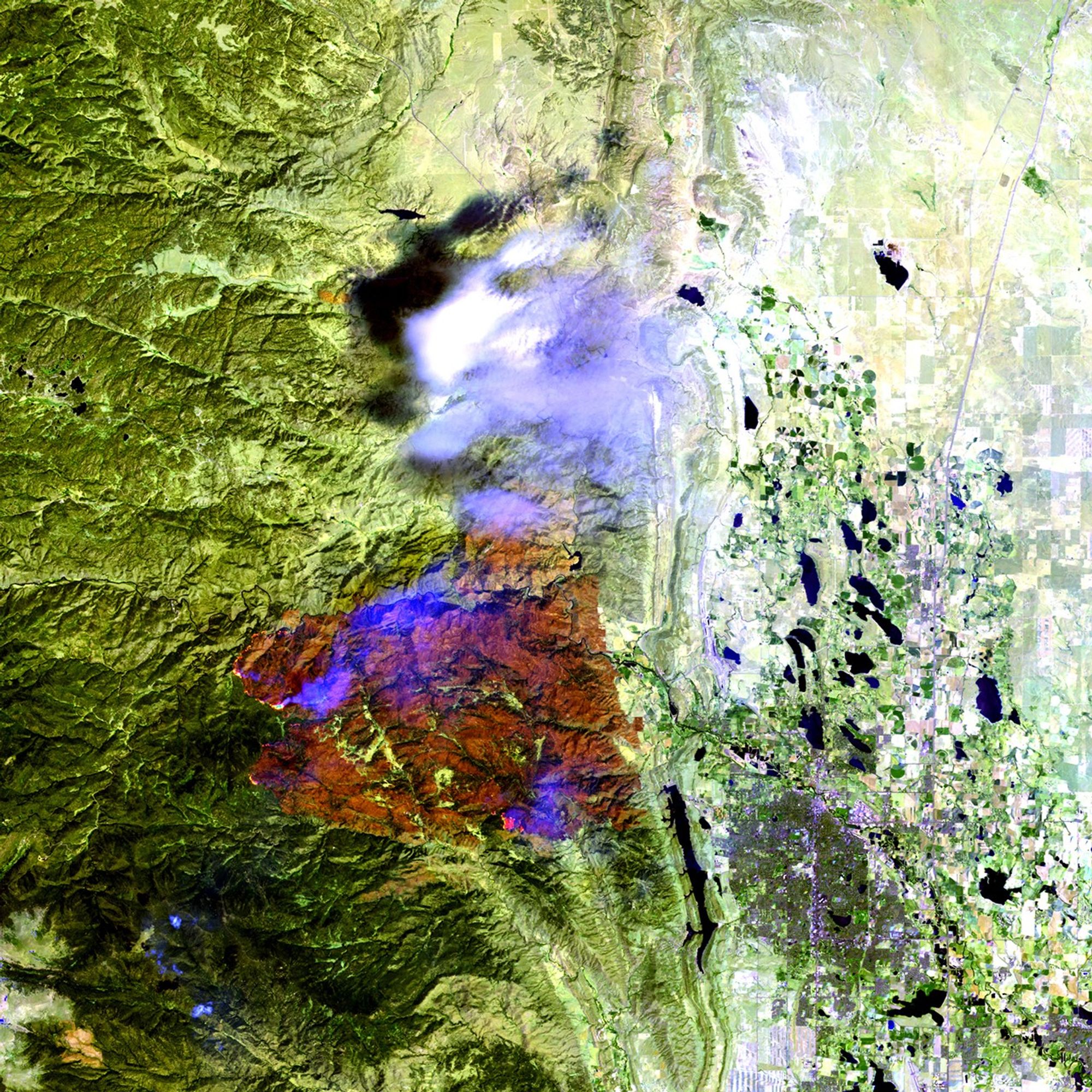 Sparked by lightning on June 9, 2012, the High Park Fire burned more than 87,000 acres near and in Roosevelt National Forest, just west of Fort Collins, Colorado. One person was killed and at least 259 homes were destroyed. High temperatures and strong winds hampered efforts to extinguish the blaze, which was the second largest in Colorado history.   Images taken by the Thematic Mapper sensor onboard Landsat 5 and the Enhanced Thematic Mapper Plus onboard Landsat 7. Sources: U.S. Geological Survey (USGS) Landsat Missions Gallery "High Park Fire, Colorado – June 2012," U.S. Department of the Interior / USGS and NASA, and denverpost.com.