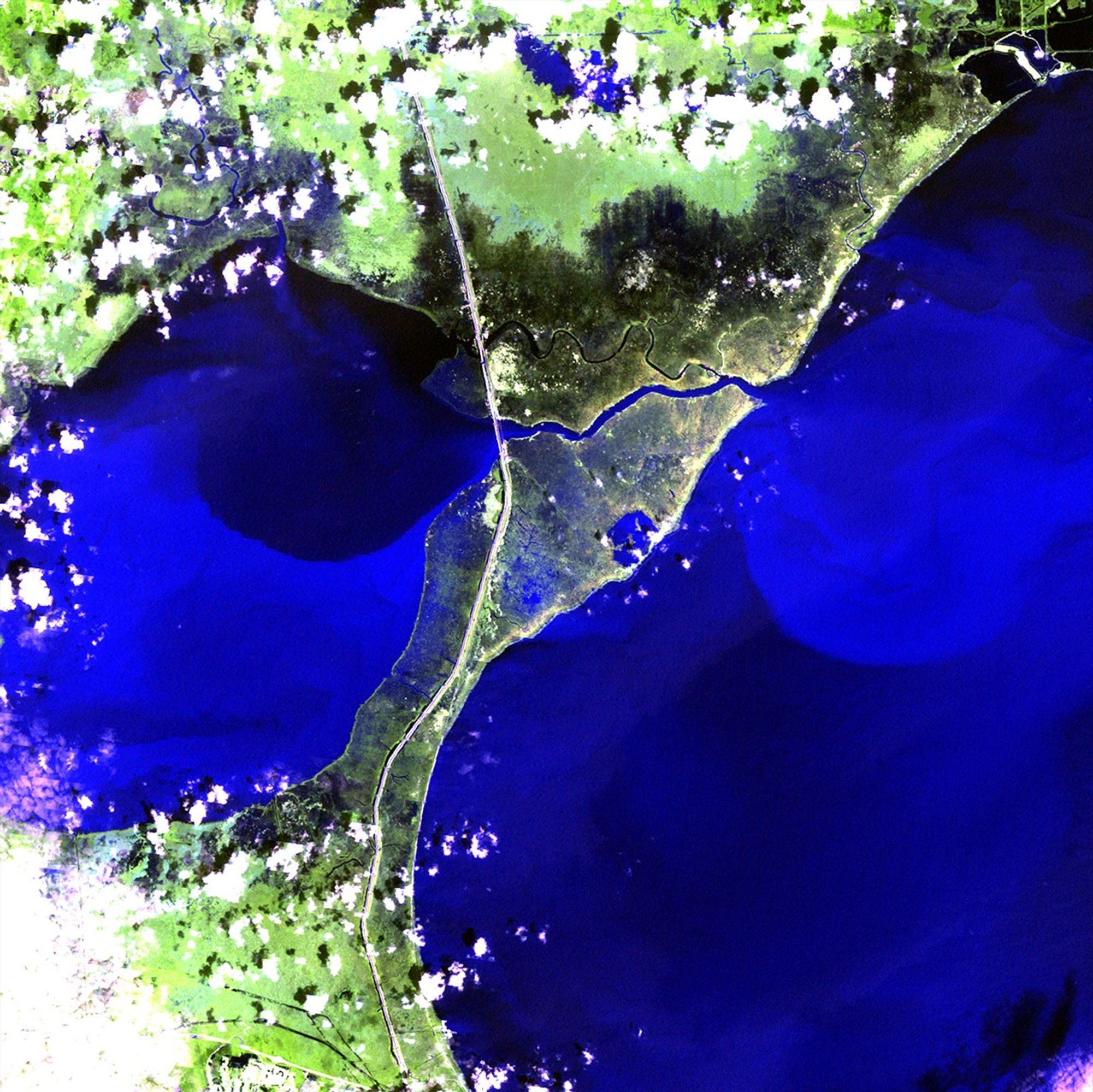 Hurricane Isaac made landfall in Louisiana on August 28, 2012, and moved very slowly north. Levees protected the New Orleans area, but strong winds, rain, and storm surges caused massive flooding in the region between Lake Maurepas and Lake Pontchartrain, northwest of the city. In the September 2 image, dark tones show saturated land and the lighter blue tones of the two lakes represent turbid water and sediment flow. These images provide a base set of information to help officials plan reclamation and remediation efforts. Images taken by the Enhanced Thematic Mapper Plus sensor onboard Landsat 7. Source: U.S. Geological Survey (USGS) Landsat Missions Gallery, "Hurricane Isaac Flooding," U.S. Department of the Interior / USGS and NASA.