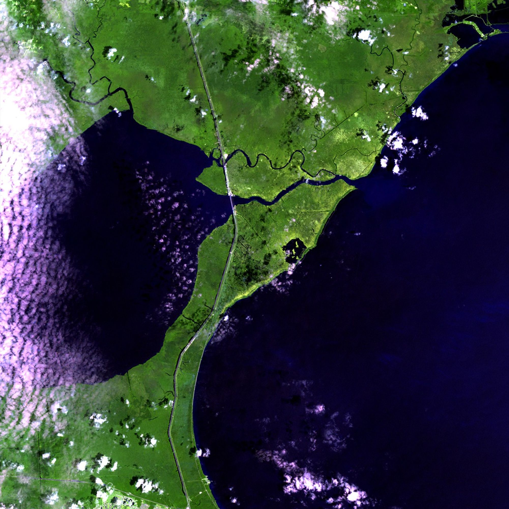 Hurricane Isaac made landfall in Louisiana on August 28, 2012, and moved very slowly north. Levees protected the New Orleans area, but strong winds, rain, and storm surges caused massive flooding in the region between Lake Maurepas and Lake Pontchartrain, northwest of the city. In the September 2 image, dark tones show saturated land and the lighter blue tones of the two lakes represent turbid water and sediment flow. These images provide a base set of information to help officials plan reclamation and remediation efforts. Images taken by the Enhanced Thematic Mapper Plus sensor onboard Landsat 7. Source: U.S. Geological Survey (USGS) Landsat Missions Gallery, "Hurricane Isaac Flooding," U.S. Department of the Interior / USGS and NASA.