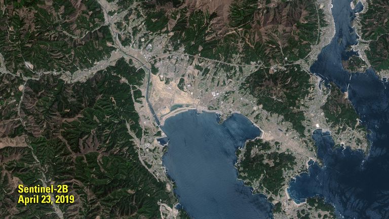 The 2011 image shows the remains of the Japanese town of Rikuzentakata (gray area in center) less than a month after a devastating tsunami. In the 2019 image, a sea wall, 41 feet (12.5 meters) high, stands between the town and Hirota Bay as a shield against future tsunamis. The 2011 image was taken by Landsat 5. The 2019 image was taken by ESA's Sentinel-2B satellite. Source: U.S. Geological Survey’s National Land Imaging Image Collections