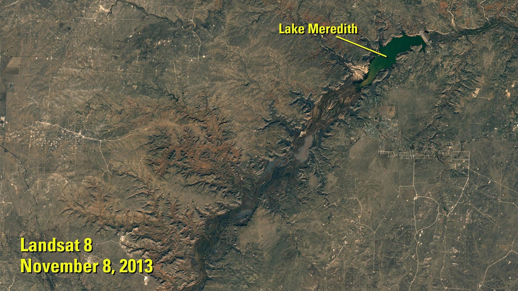 Lake Meredith is a reservoir on the Canadian River in the Texas Panhandle. More than a decade of drought brought its depth to a record low in 2013. (See Lake Meredith shrinkage, Texas.) Recovery began with heavy rain in 2017, and its surface area more than doubled by the time of the 2018 image. A dam separates the lake’s northeastern tip from the Canadian River.   Images taken by the Operational Land Imager on Landsat 8. Sources: U.S. Geological Survey’s National Land Imaging Image Collections, Canadian River Municipal Water Authority and National Weather Service.