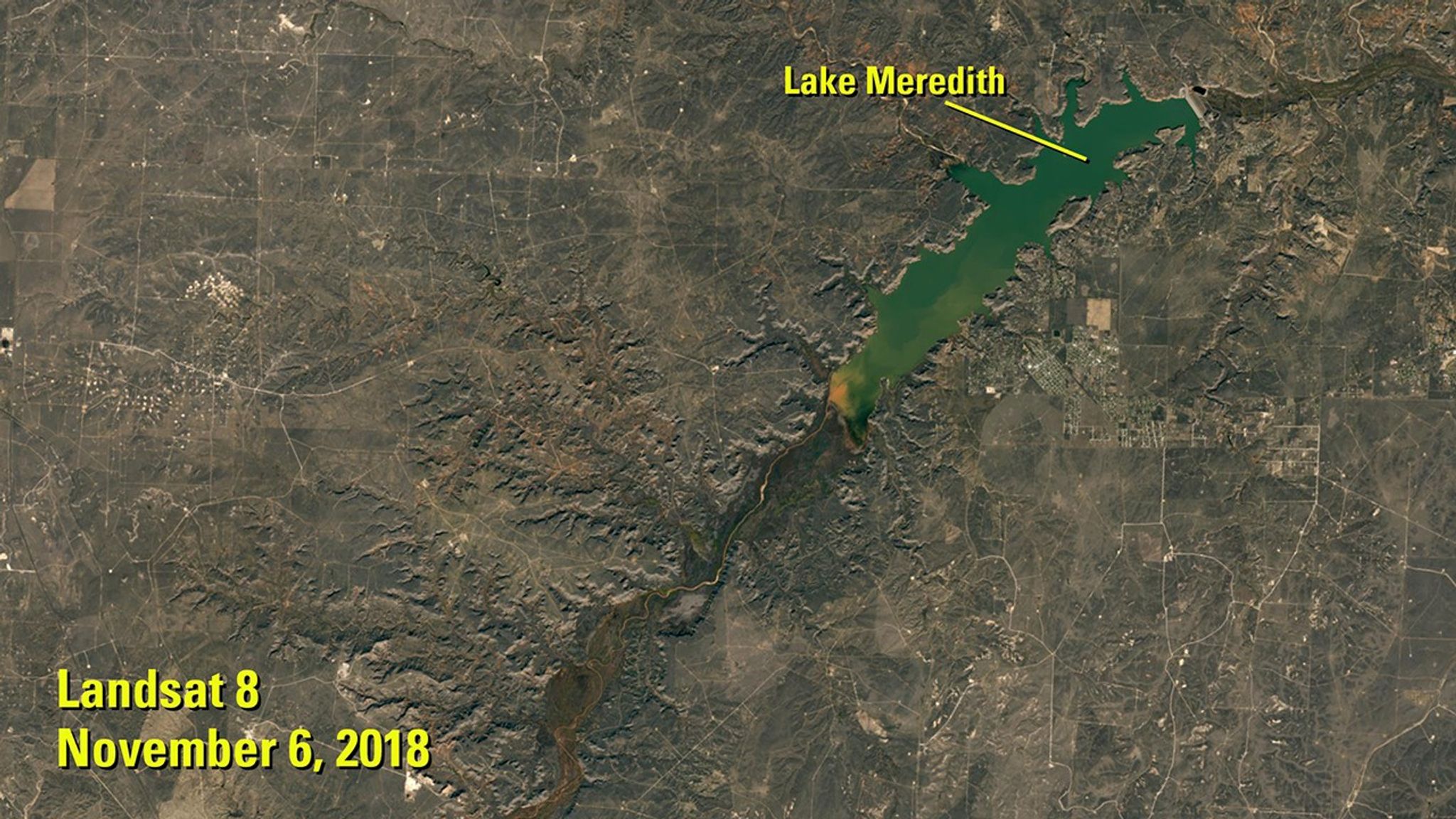 Lake Meredith is a reservoir on the Canadian River in the Texas Panhandle. More than a decade of drought brought its depth to a record low in 2013. (See Lake Meredith shrinkage, Texas.) Recovery began with heavy rain in 2017, and its surface area more than doubled by the time of the 2018 image. A dam separates the lake’s northeastern tip from the Canadian River.   Images taken by the Operational Land Imager on Landsat 8. Sources: U.S. Geological Survey’s National Land Imaging Image Collections, Canadian River Municipal Water Authority and National Weather Service.