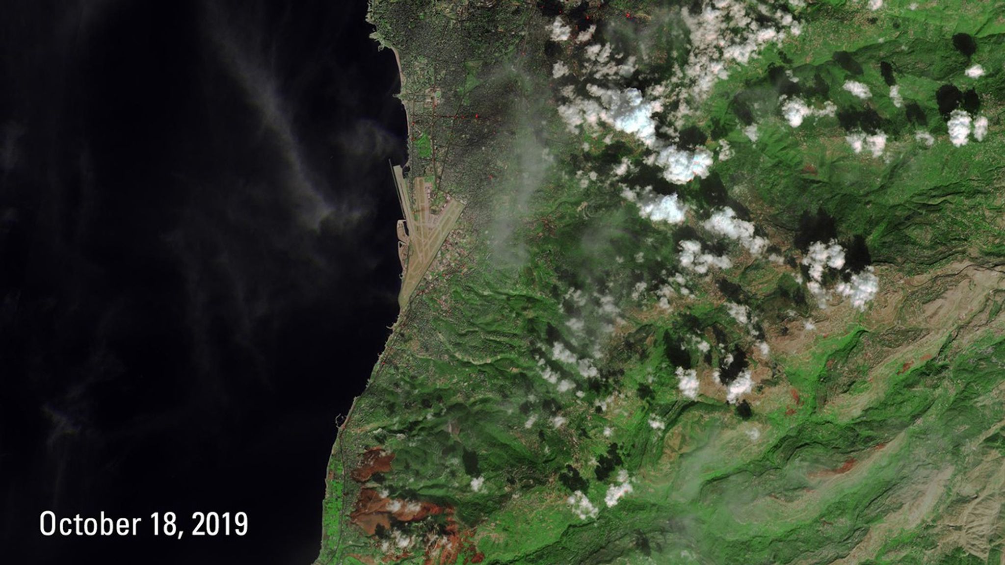 The Oct. 8 image shows a portion of Lebanon before the wildfires of mid-October 2019. The burn scars they left are visible as brown patches at the bottom of the Oct. 18 image. North of the scars is Beirut, the country's capital, where protesters set numerous fires, seen in the later image as red dots. Images taken by the European Space Agency's Sentinel-2A satellite. Source: U.S. Geological Survey’s National Land Imaging Image Collections