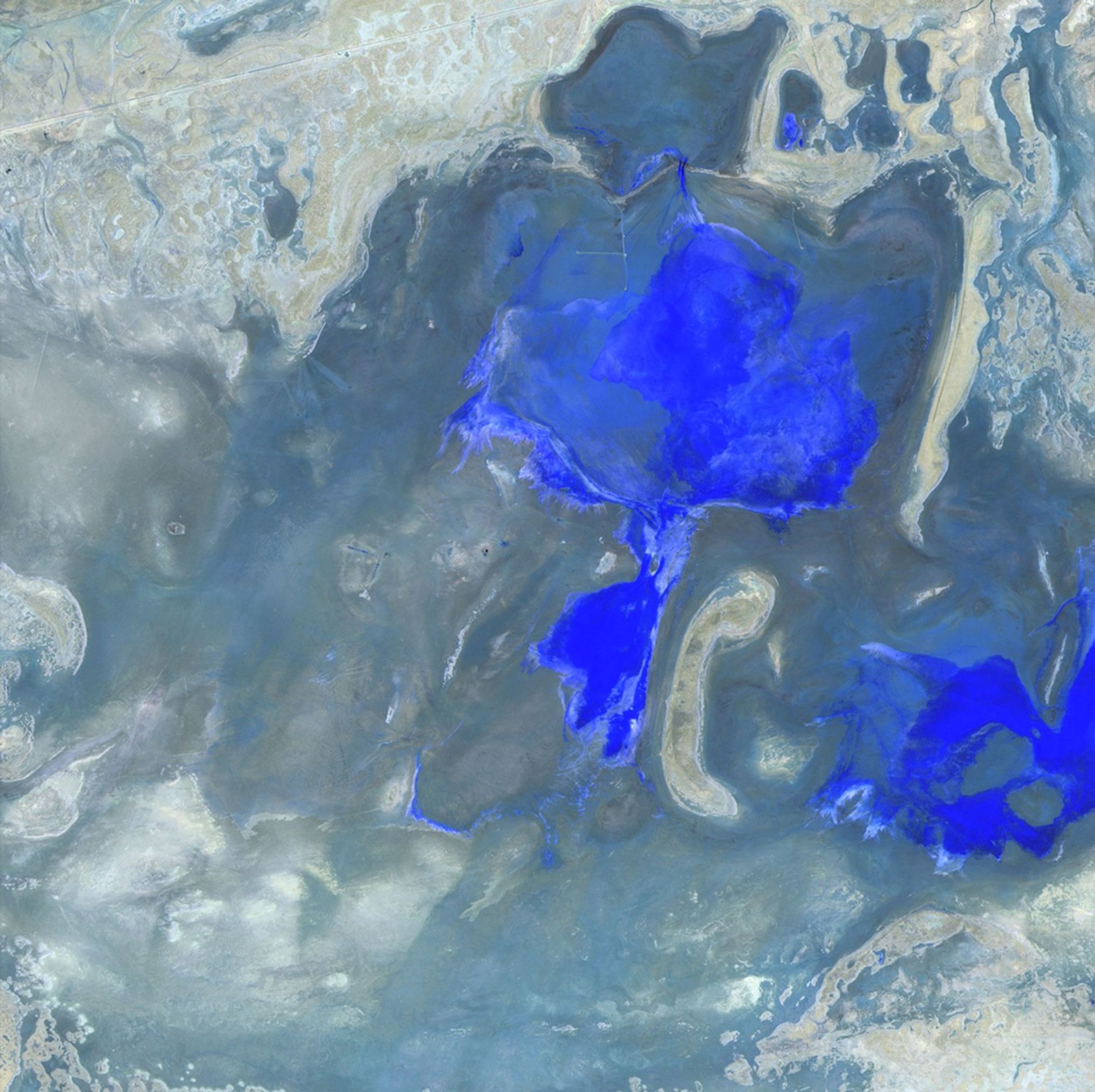 The landscape of Kazakhstan's Mangystau Province, near the Caspian Sea, has changed since oil and gas deposits in the region began to be exploited in the early 1990s. The 2011 image shows production facilities in the desert with settlements built around them. Increased fossil fuel production in this area has raised concerns about the quality and availability of freshwater needed for rural development and public health. Images taken by the Thematic Mapper sensor onboard Landsat 5. Source: USGS Landsat Missions Gallery, "Expanding Oil Production in Mangystau Province, Kazakhstan," U.S. Department of the Interior / U.S. Geological Survey.