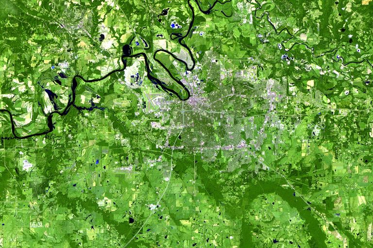 Montgomery, the capital of Alabama, sits by the Alabama River in the south central portion of the state. Its population has nearly doubled during the past 30 years, from just under 125,000 to more than 200,000, thanks to increased tourism and commercial and industrial development. These images show changes from forest and croplands to urban and industrial areas around Montgomery and Prattville, located across the river on the northern side. The changes have been a major factor in altering regional air quality and the production of crops and lumber.   Images taken by the Thematic Mapper sensor onboard Landsat 5. Source: U.S. Geological Survey (USGS) Landsat Missions Gallery, "Urban Growth of the Montgomery, Alabama, area," U.S. Department of the Interior / USGS and NASA.