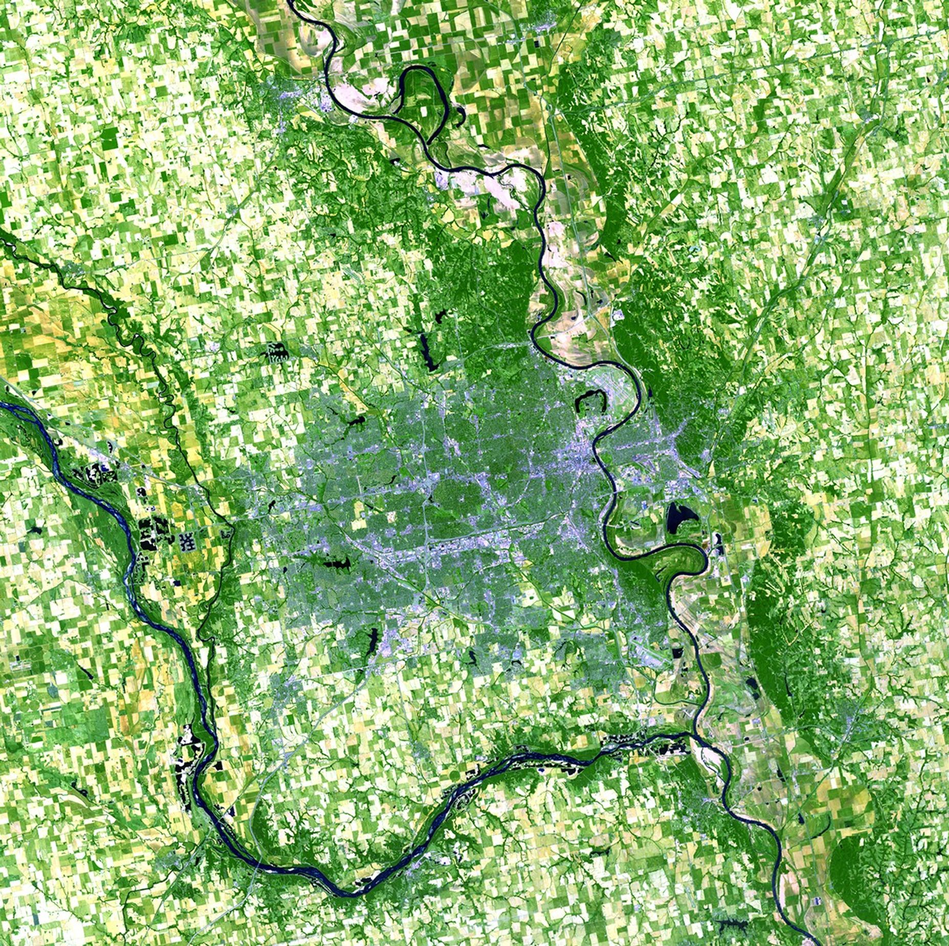 In the spring and summer of 2011, the Missouri River experienced extreme flooding. Record snowfall in the Rocky Mountains of Montana and Wyoming, along with near-record spring rainfall in central and eastern Montana, triggered dangerously high reservoir levels in Montana and the Dakotas. A record amount of water was released into the river to prevent overtopping of dams, which contributed to flooding downstream. Warm, dry weather has allowed the river to return to its banks, while cleanup continues on the highways and areas along the entire Missouri River. See also Flooding, Iowa. Images taken by the Enhanced Thematic Mapper Plus sensor onboard Landsat 7. Source: U.S. Geological Survey (USGS) Landsat Missions Gallery, "Missouri River near Omaha, NE - one year after flooding," U.S. Department of the Interior / USGS and NASA.