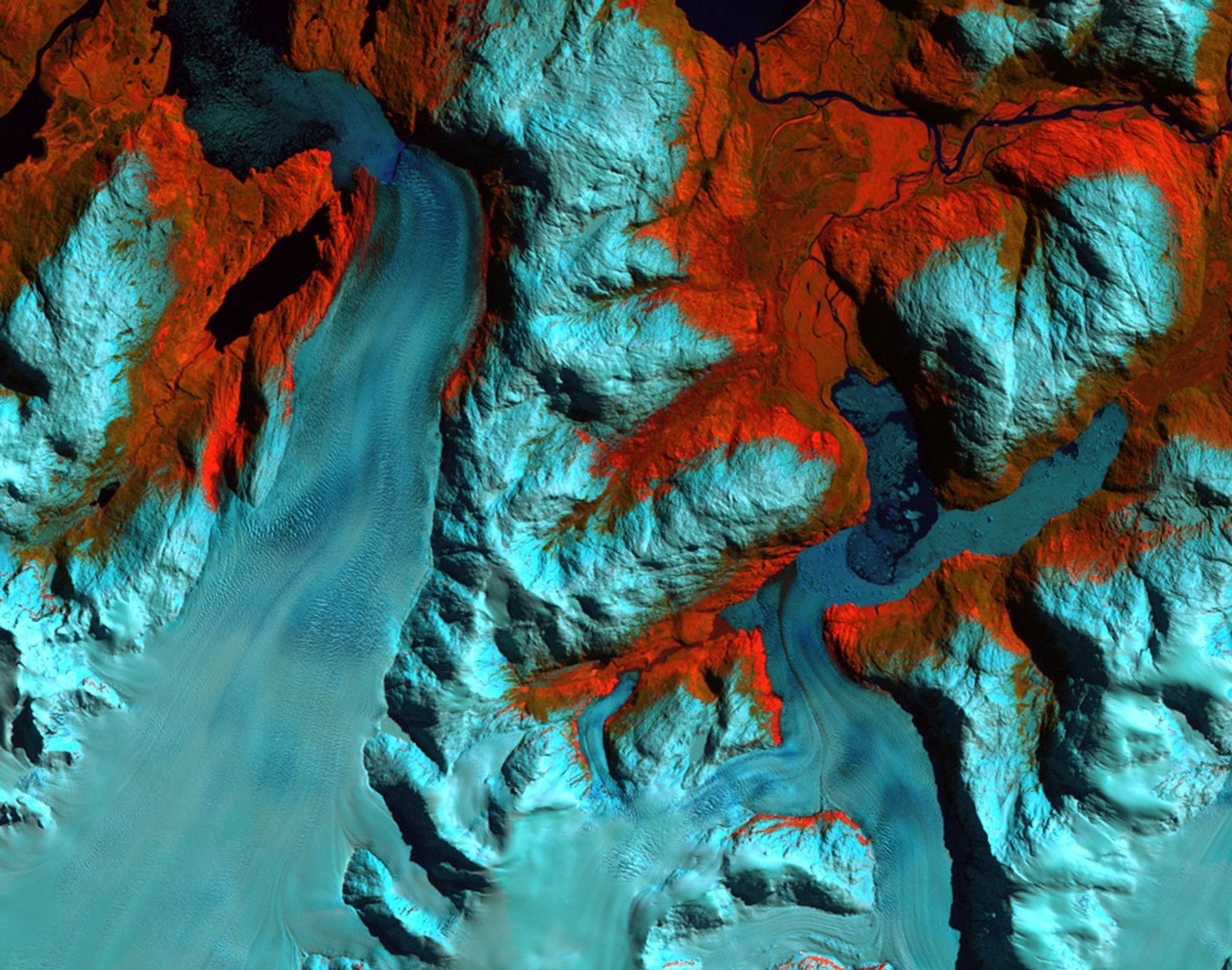 Patagonia, Chile. Left: September 18, 1986. Right: August 5, 2002. The 1986 image shows the region prior to a major retreat of the glaciers. The 2002 image shows a retreat of nearly 10 kilometers (6.2 miles) of the glacier on the left side. The smaller glacier on the right has receded more than 2 kilometers (1.2 miles). In front of the smaller glacier, two ribbon lakes have formed behind the debris left by the glacier's advance. Scientists and government managers are using satellite imagery like this to monitor the retreat of the glaciers and the impact on water bodies caused by the changes in the glaciers’ size and direction. Left image taken by the Thematic Mapper sensor onboard Landsat 5. Right image taken by the Enhanced Thematic Mapper Plus sensor onboard Landsat 7. Source: USGS Landsat Missions Gallery, "Patagonia Region - Retreating Glaciers," U.S. Department of the Interior / U.S. Geological Survey.