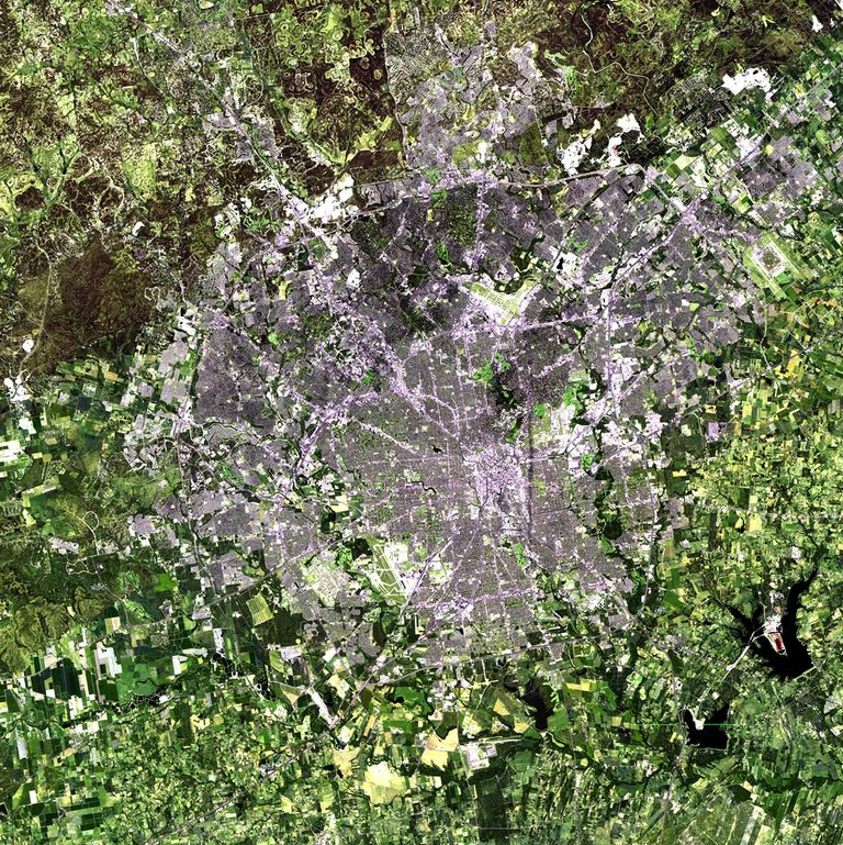 San Antonio has grown faster during the last two decades than all but three other cities in the U.S., nearly doubling from 790,000 people in 1991 to 1.4 million in 2010. Under state law, which allows the city to direct growth and zoning in much of the surrounding unincorporated land, San Antonio has opposed the creation of other nearby municipalities and has preserved agricultural production areas. A series of military bases and airfields, which ring the larger community, have also contributed to the city's growth. Images taken by the Thematic Mapper sensor aboard Landsat 5. Source: USGS Landsat Missions Gallery, "San Antonio, Texas 1991-2010," U.S. Department of the Interior / U.S. Geological Survey.