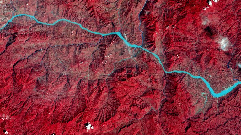 China’s Three Gorges Dam on the Yangtze River became the world’s largest hydroelectric power plant upon its completion in 2012. It has also eased flooding and river navigation and provided water for irrigation. However, construction forced some 1.2 million people to relocate and, according to a 2010 study, triggered about 3,400 earthquakes and numerous landslides from mid-2003 through 2009. Changes in river flow have raised concerns about silt accumulation and biodiversity loss. Important archeological sites and ancient monuments were reportedly inundated as the reservoir filled. Forested areas appear red in these images to represent measurements by infrared sensors. 1993 image: Landsat 5. 2016 image: Landsat 8. Source: U.S. Geological Survey (USGS) Landsat Missions Gallery; U.S. Department of the Interior / USGS and NASA.