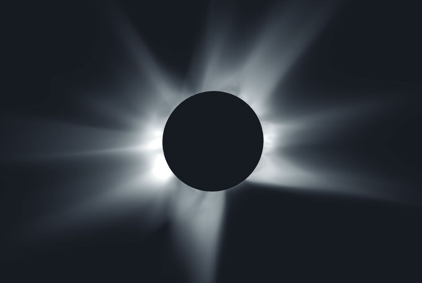 A simulated image of a total solar eclipse shows the Moon as a black disk at the center surrounded by white rays extending outward around the Moon, set against a black background. Some of the rays are longer or thicker than others.