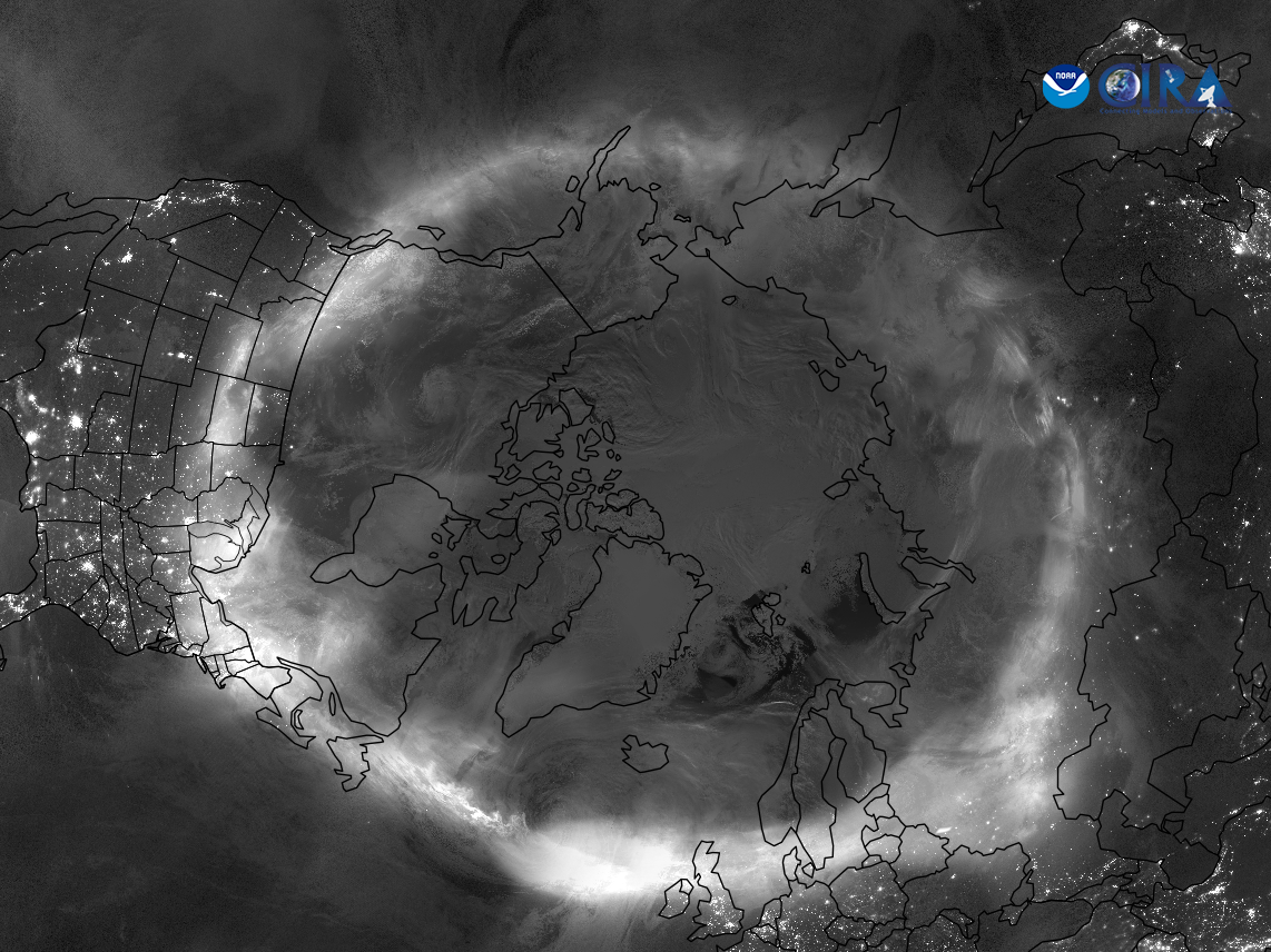 A grayscale top-down image of the North Pole showing the glowing band of the Northern Lights circling the Earth