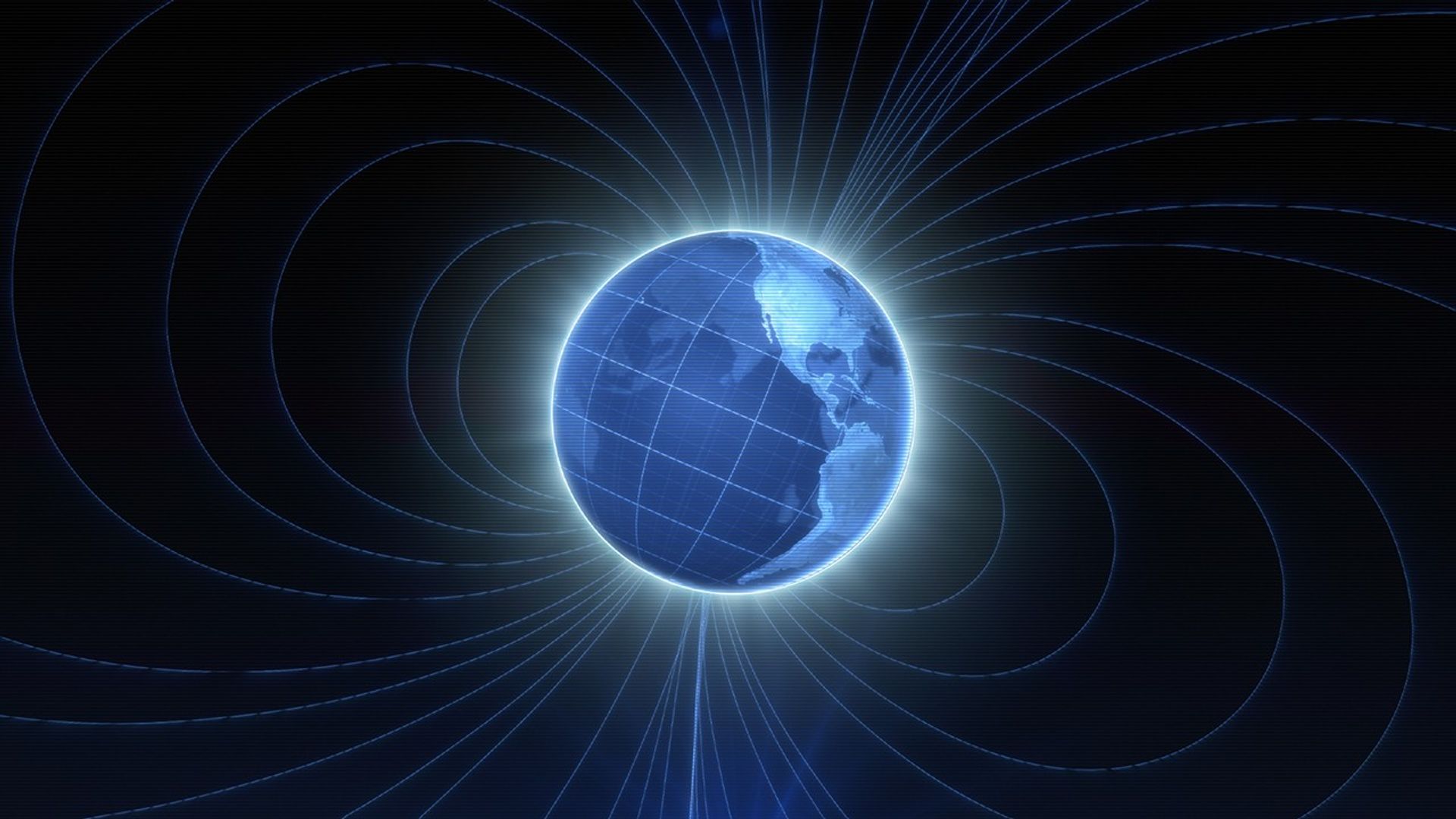 A glowing blue Earth is shown with grid lines and magnetic field lines arching around it, illustrating the planet’s magnetic field in space against a dark background. North and South America are visible.