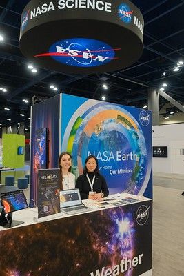 Project Manager and Chief Scientist of the SWxPO mans the Space Weather Exhibit Booth for NASA at AMS's Annual Meeting