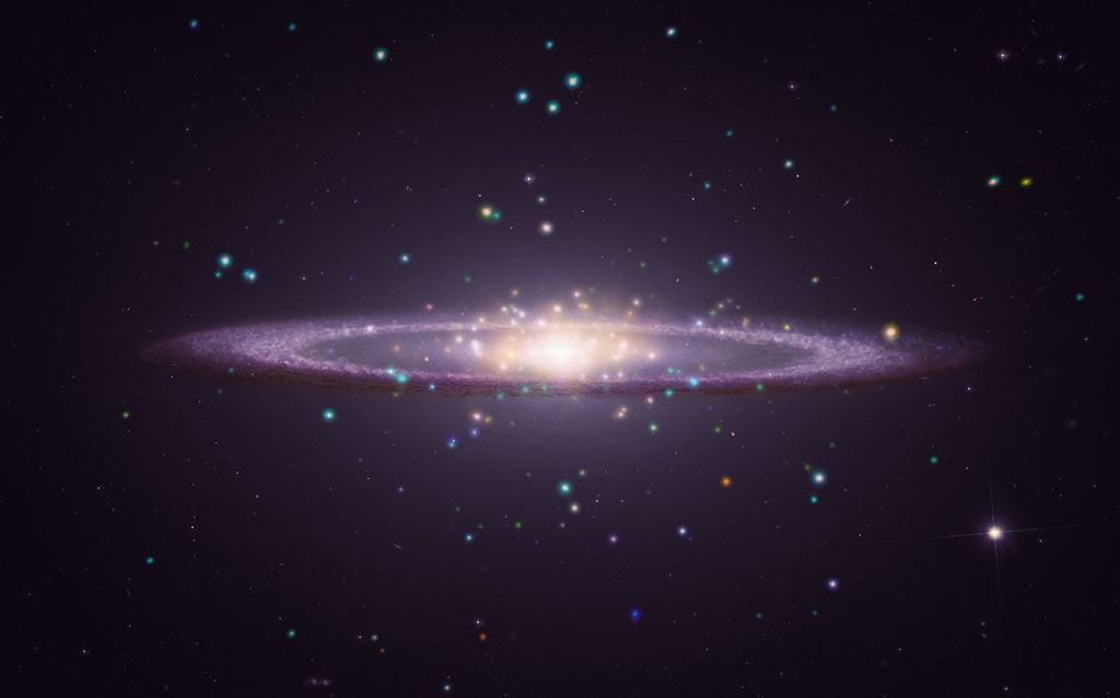 Famous for its broad central bulge and dark outer dust ring, this galaxy sits at a nearly edge-on tilt to Earth. Chandra X-rays (cyan and orange) isolate compact point sources and hot gas in the galaxy's sprawling halo, merged with Hubble optical light (warm white) and Webb infrared vision (purple-red dust lane). Studying M104 may help bridge the gap between spirals and ellipticals, helping astronomers better understand how a galaxy's giant outer cloud of stars grows and ages alongside its inner disk.