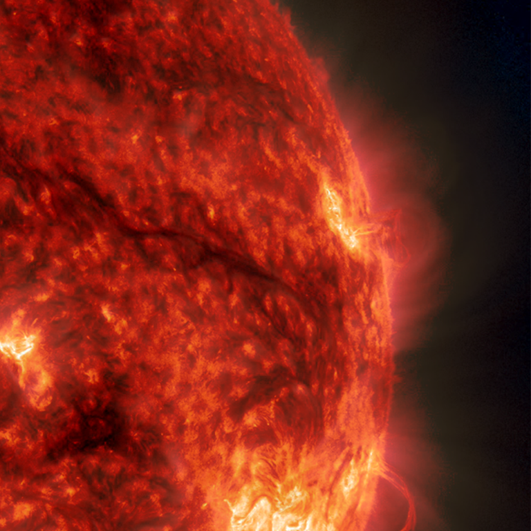 An orange and yellow image of the surface of the Sun