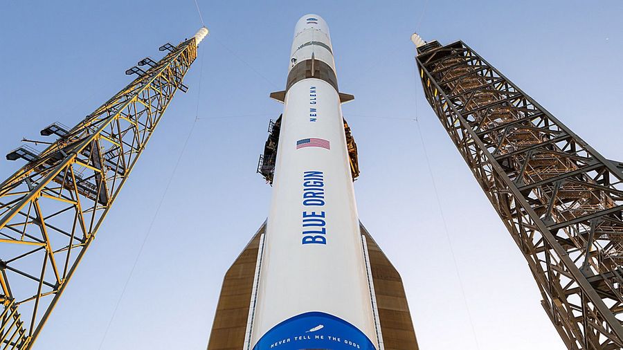 Blue Origin rocket carrying NASA's ESCAPADE sits vertical on launch pad.
