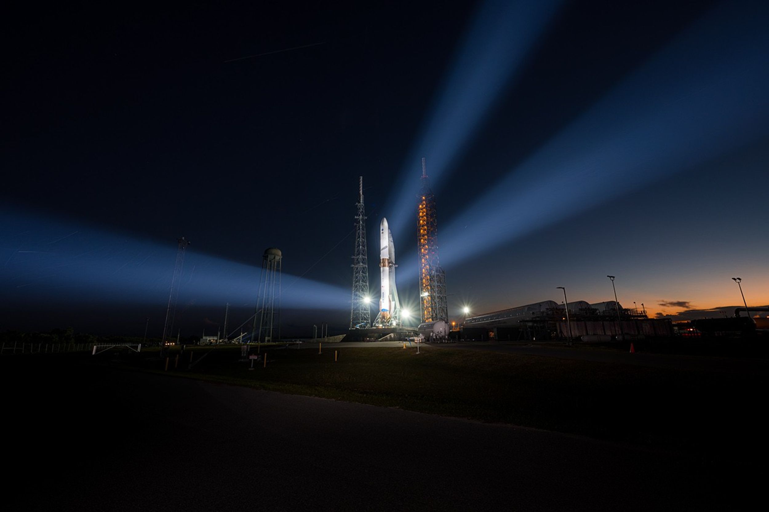 Blue Origin rocket carrying NASA's ESCAPADE is vertical on launch pad.
